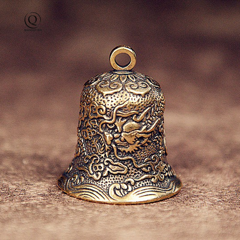 Vintage Brass Bell Carved Drag - Vintage Collectible Bells review and price