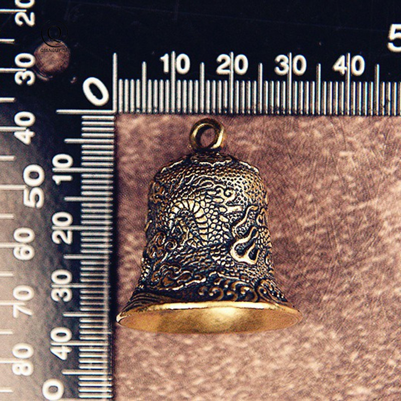 Vintage Brass Bell Carved Drag - Vintage Collectible Bells review and price