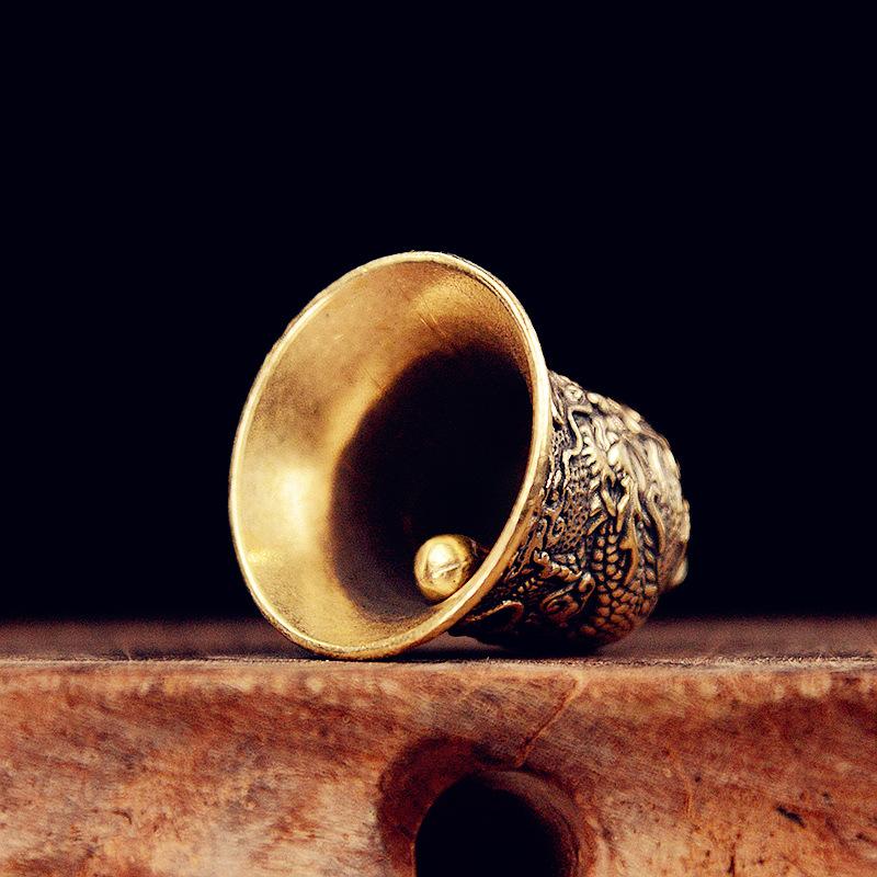 Vintage Brass Bell Carved Drag - Vintage Collectible Bells review and price