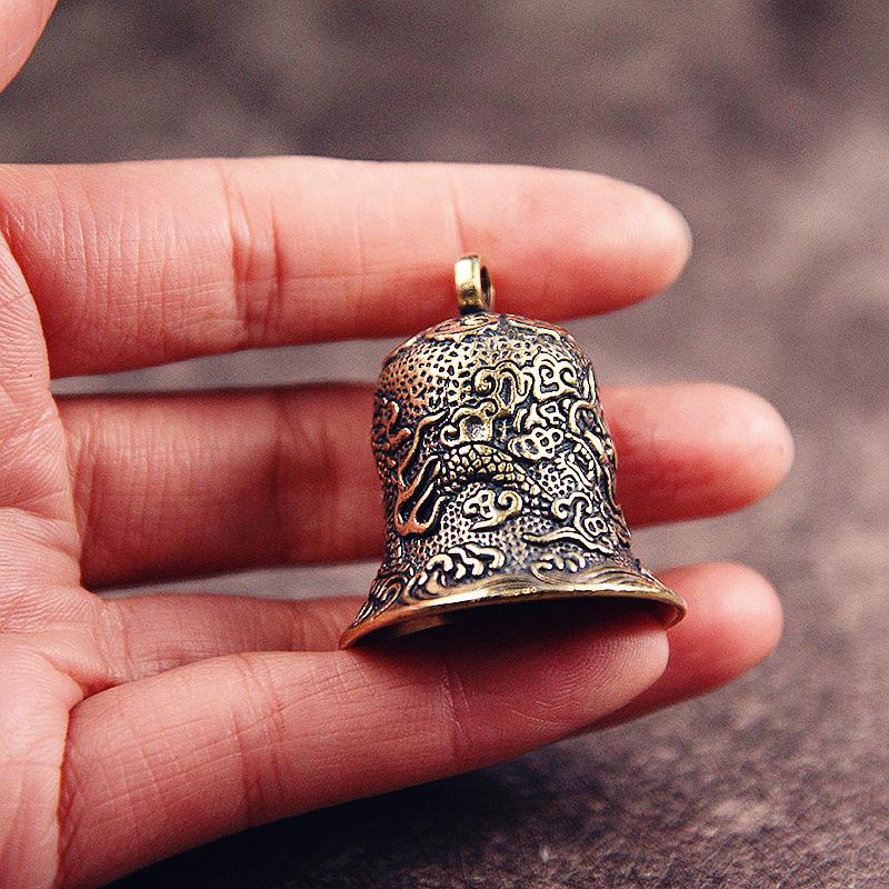Vintage Brass Bell Carved Drag - Vintage Collectible Bells review and price