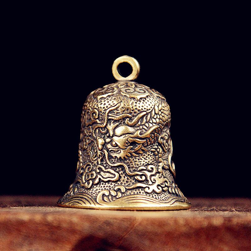 Vintage Brass Bell Carved Drag - Vintage Collectible Bells review and price