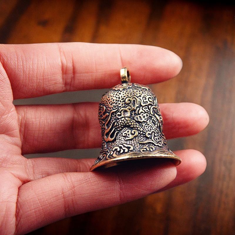Vintage Brass Bell Carved Drag - Vintage Collectible Bells review and price