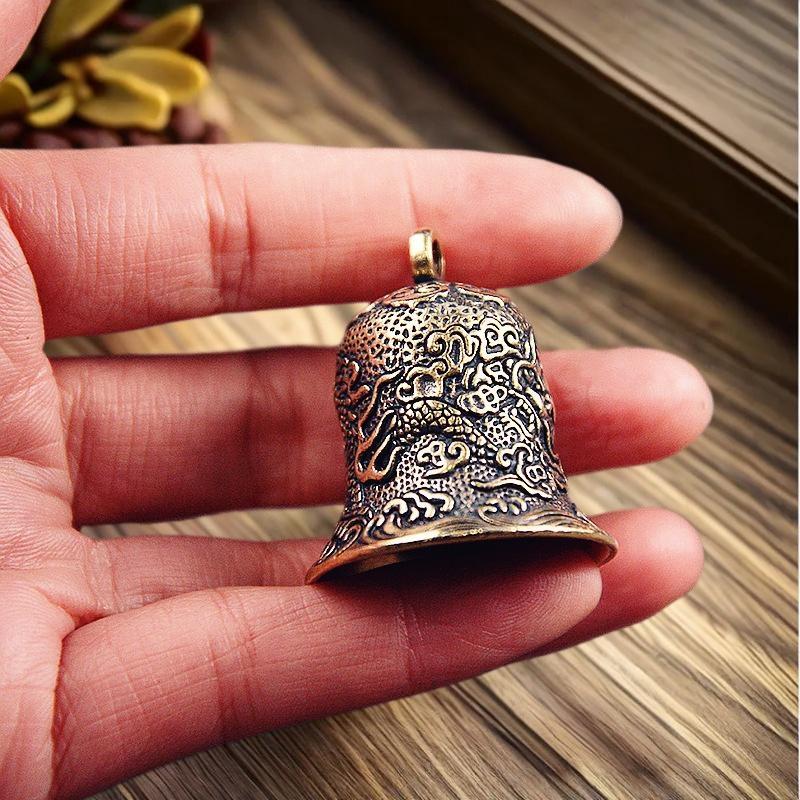 Vintage Brass Bell Carved Drag - Vintage Collectible Bells review and price